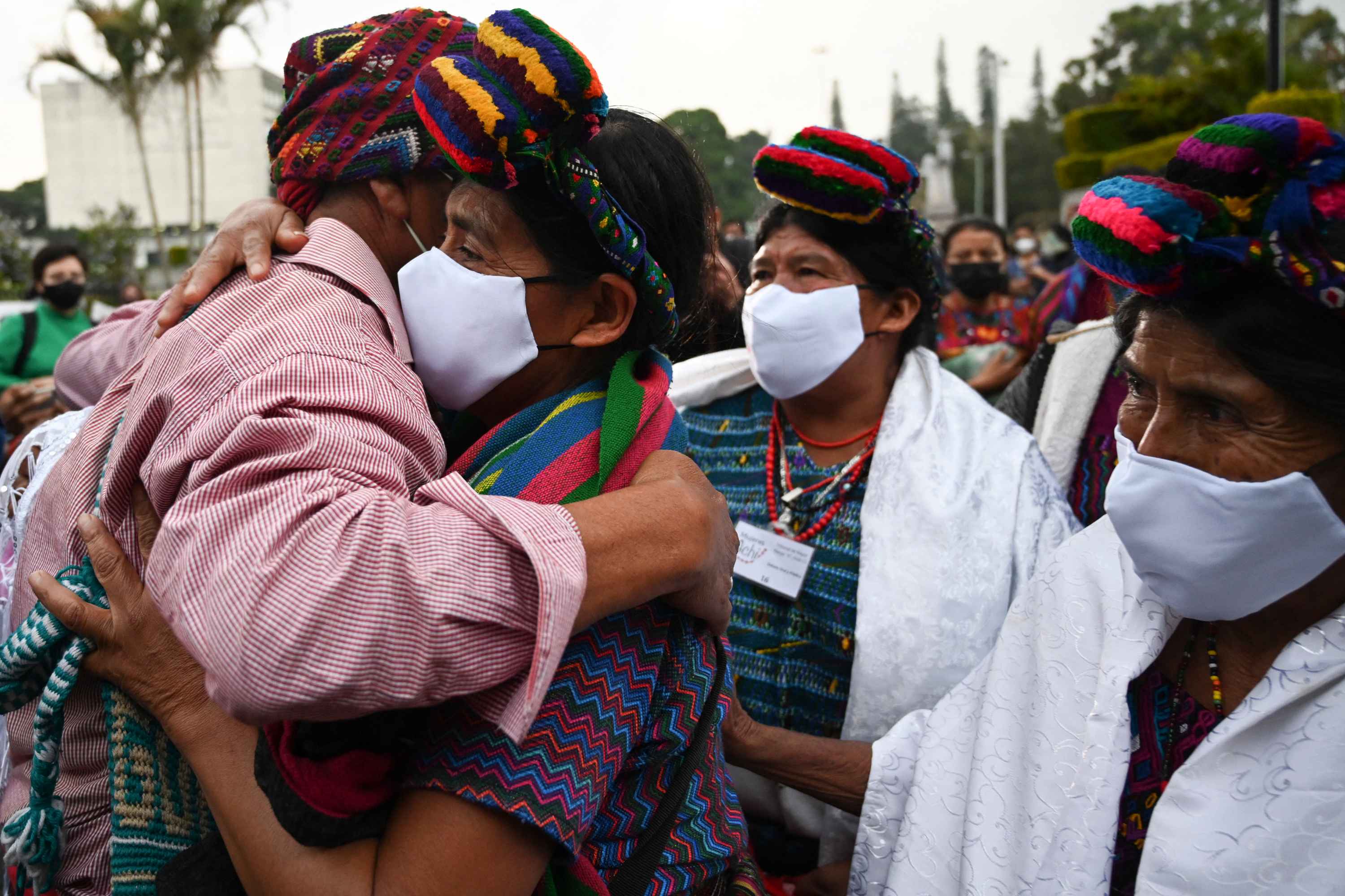 Maya Achi women, victims of sexual violence during Guatemala's internal armed conflict (1960-1996), react at the end of the trial against five former Guatemalan Civil Patrol (PAC) members, outside the Justice Palace in Guatemala on Jan. 24, 2022. Five former Guatemalan paramilitaries were sentenced Monday by a court to 30 years in prison for sexual violence committed against Indigenous women in the municipality of Rabinal, Baja Verapaz in the 1980s during the conflict. Photo: Johan Ordóñez/AFP