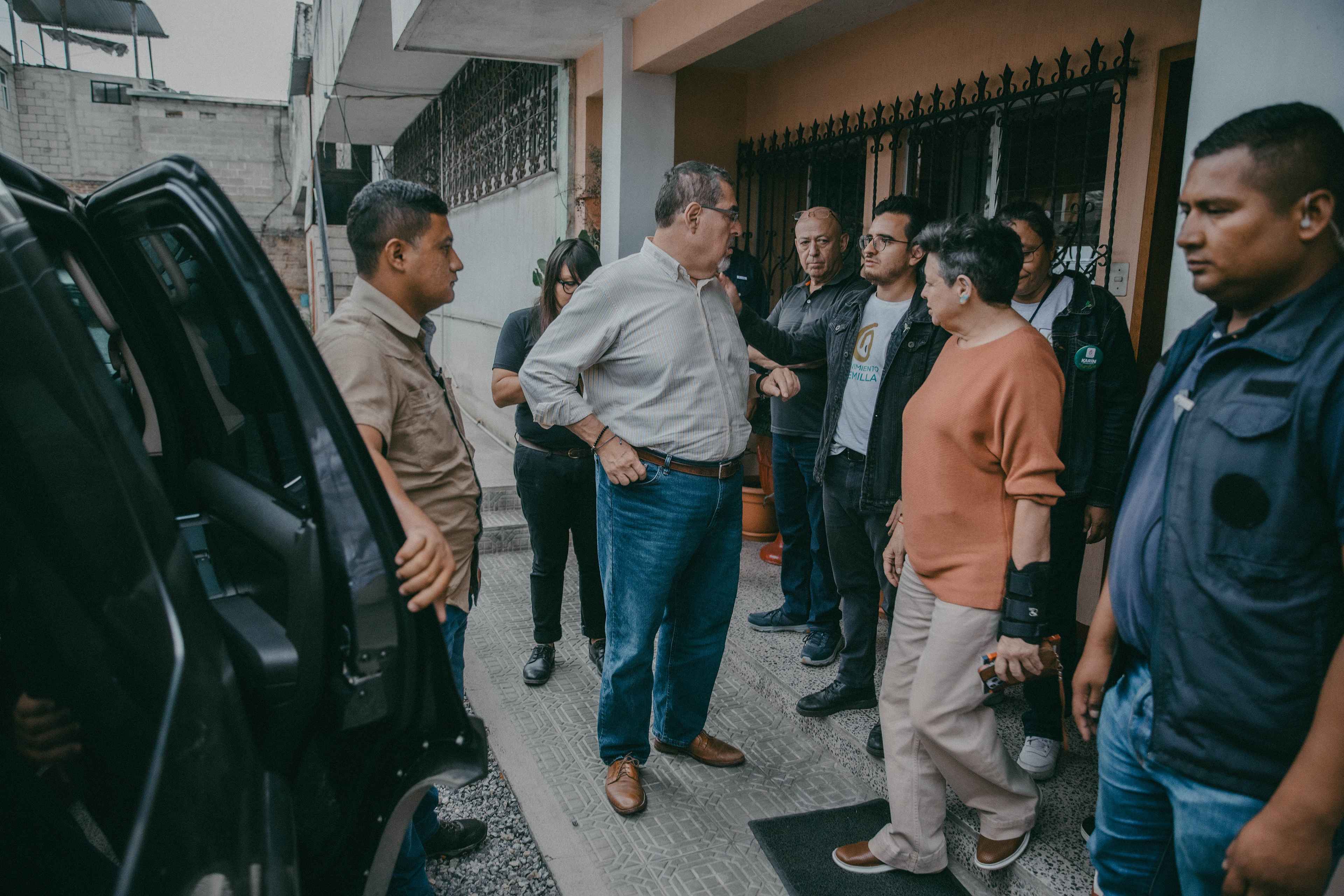 Bernardo Arévalo talks with his campaign manager, political scientist Justo Pérez, after a private conversation with Cardinal Álvaro Ramazzini at the offices of the Huehuetenango Diocese on Friday, August 11. In late July, Ramazzini publicly called for forming a nationwide citizen's front for democracy to fight the efforts of different political parties and the Attorney General’s Office to invalidate the results of the first round of elections.