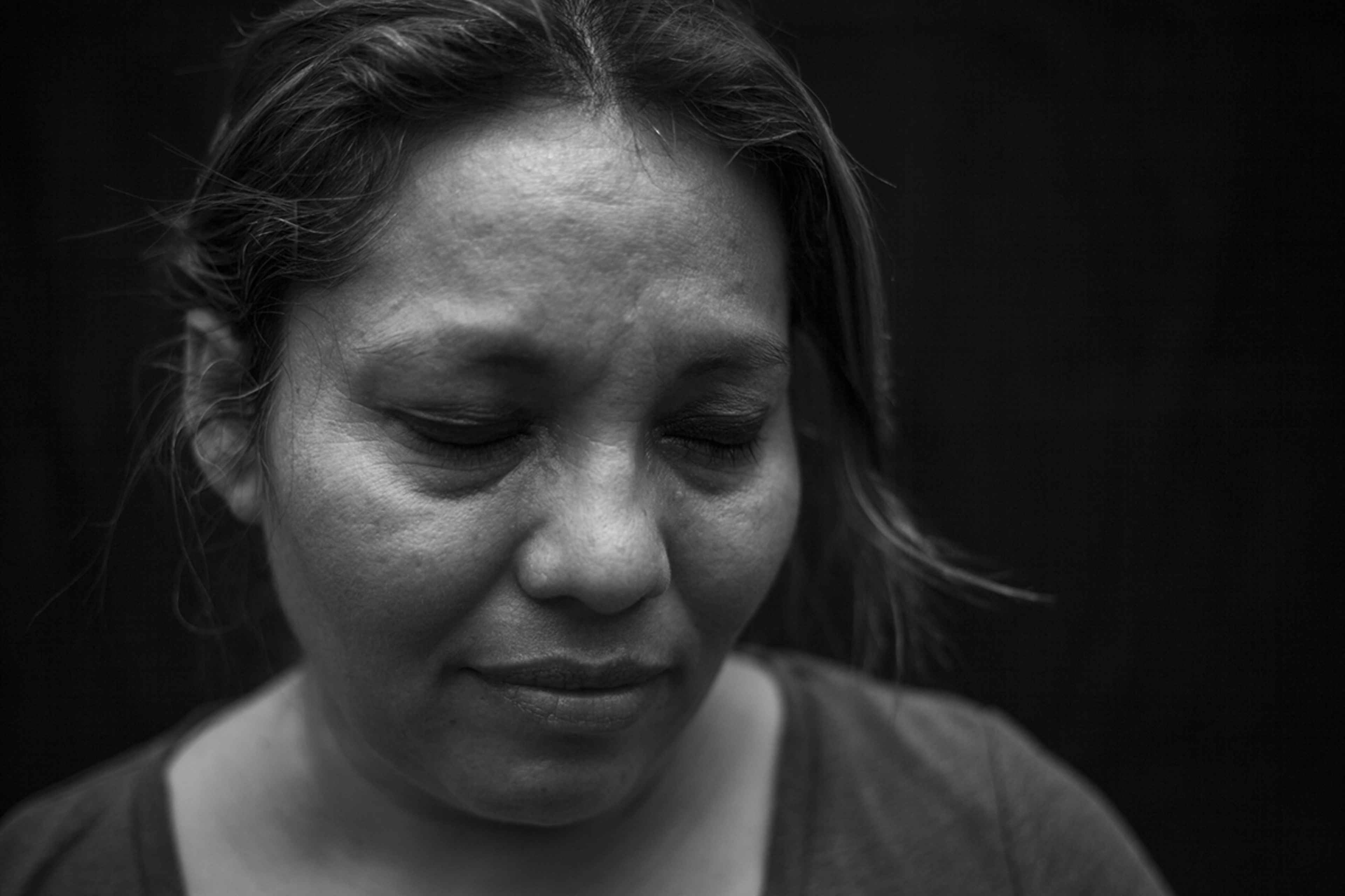 Teresa del Carmen Jordán, 40, victim of Canoas: “I was four years old. I remember when my mother Elsa Jordán fell because they killed her in front of me. My sister Marleni Jordán and I threw ourselves on top of my dead mother and the soldiers grabbed us by the arms and dragged us to get us to let her go. I remember the roads where they took us out. They hit me with their boots to make me walk fast. They took us to the San Juan de Dios hospital in Santa Ana and we spent 15 days there. Since no one claimed us, they transferred us to the Adalberto Guirola home in Santa Tecla. After three months, my grandmother Petrona Jaco found us. We recognized her immediately, and that’s how she got us back. This is the first time I have come here since the massacre. I think it is the only place where I might have had a mother. It feels ugly and beautiful at the same time.” Marleni, Teresa's younger sister, is a homemaker in Coatepeque, Santa Ana.