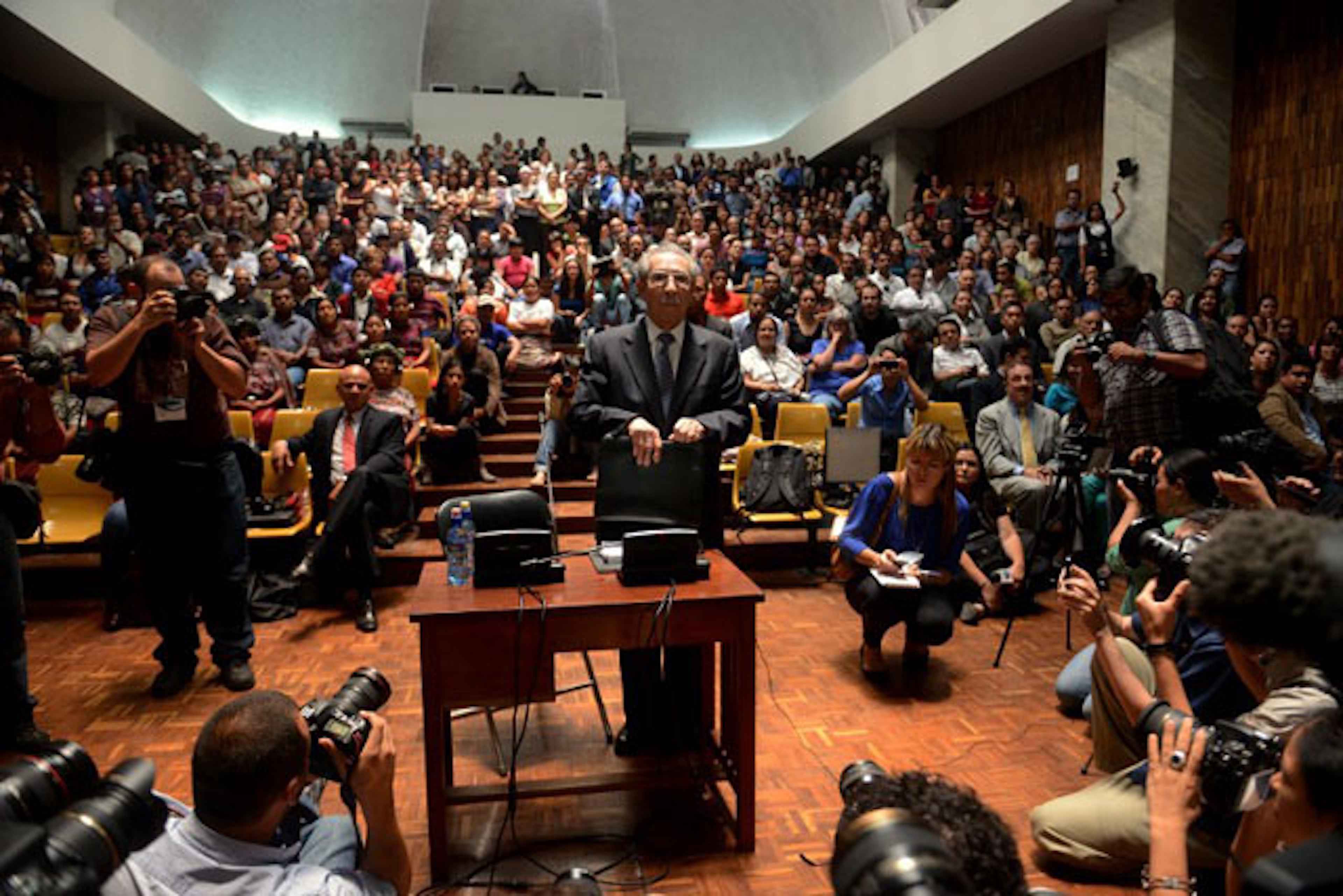 Former Guatemalan dictator José Efraín Ríos Montt, 86 years old, speaks during his trial on charges of genocide committed during his regime in Guatemala City on May 9, 2013. The trial against Ríos Montt, initiated 50 days earlier, entered the final phase after the judges rejected the petitions of his lawyers to postpone it and the Public Prosecutor's Office requested 75 years' imprisonment. Photo Johan Ordóñez/AFP
