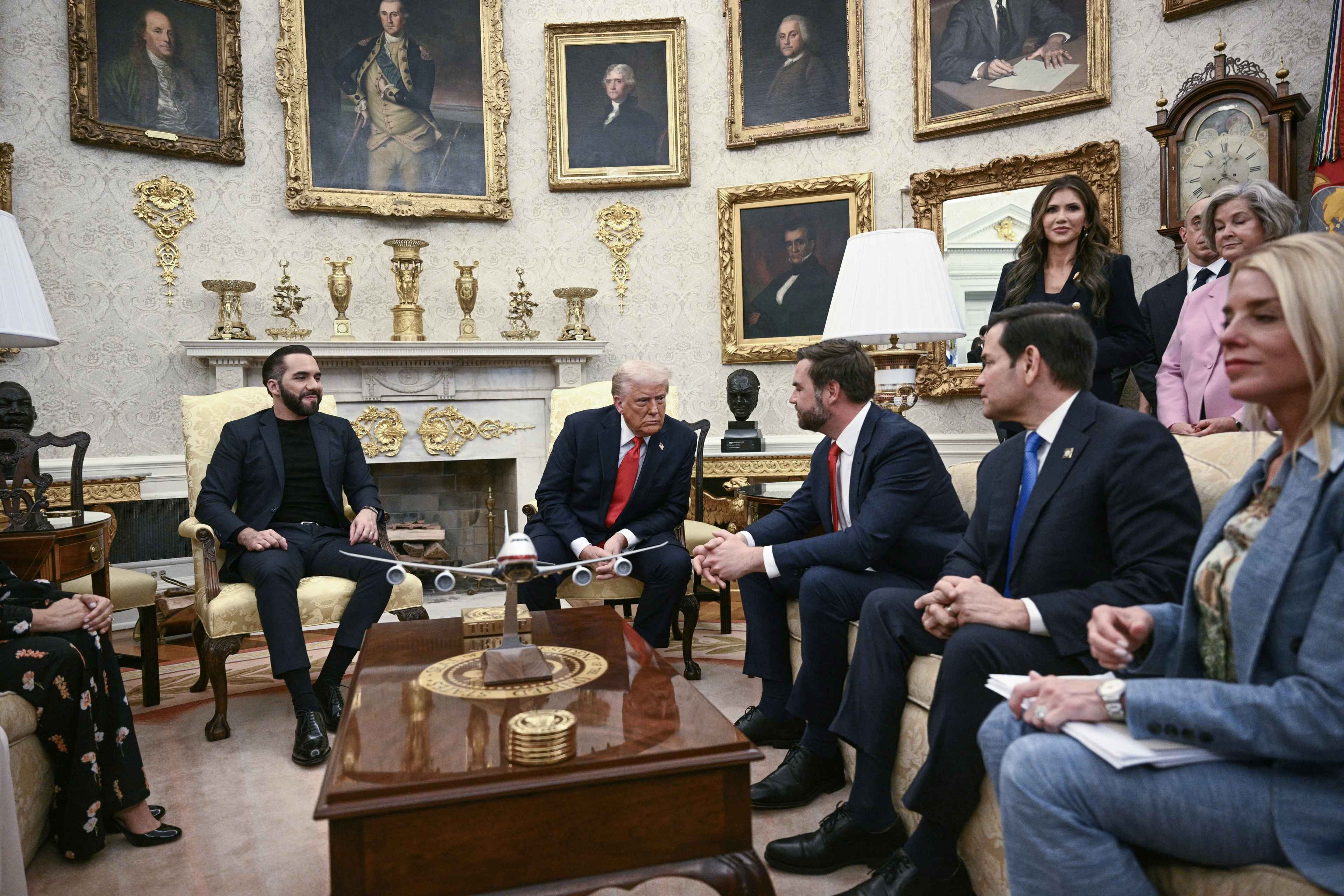 J.D. Vance (center) speaks during a meeting between Donald Trump and Nayib Bukele in the Oval Office in Washington, D.C., Apr. 14, 2025. To his left is top Trump diplomat Marco Rubio. The meeting comes as the White House faces pressure over the case of Kilmar Ábrego, a Maryland father wrongfully rendered and jailed in El Salvador. A U.S. court has ordered the Trump administration to facilitate Ábrego's return, but both Trump and Bukele said they will not. Photo Brendan Smialowski/AFP